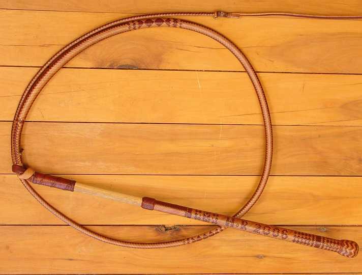 Picture 125.jpg - Half plait stockwhip 32 strand handle 16 plait thong with "HR 2006" plaited in the handle